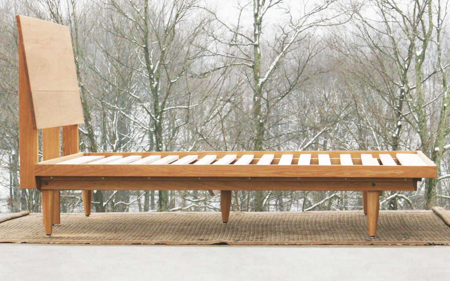 side view Mid Century Platform Bed with Slanted Headboard