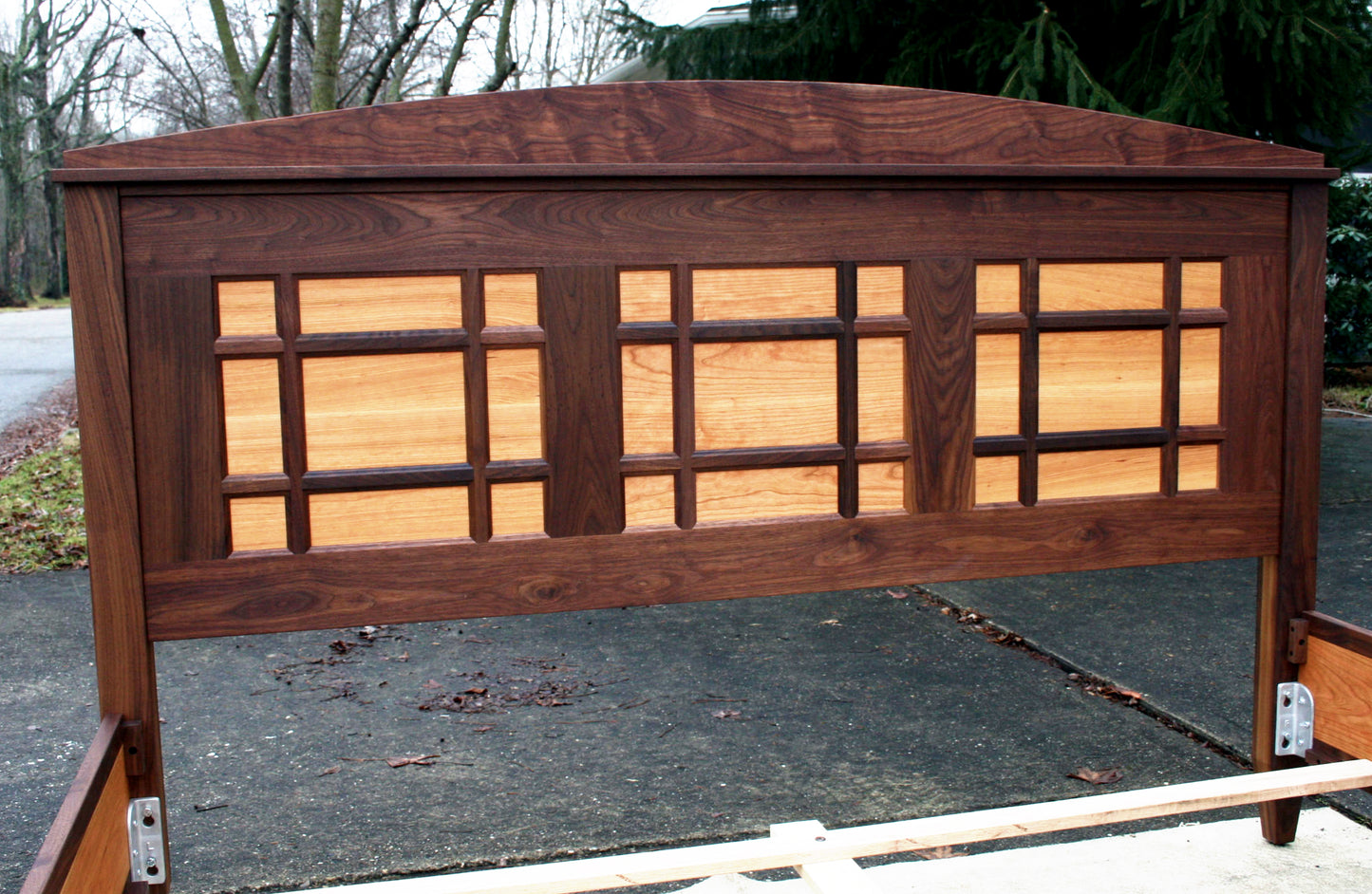 box bed with a grid pattern headboard view