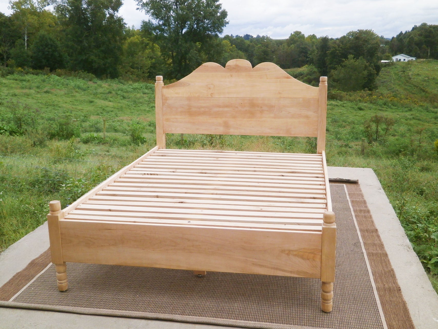 classic four poster bed front view