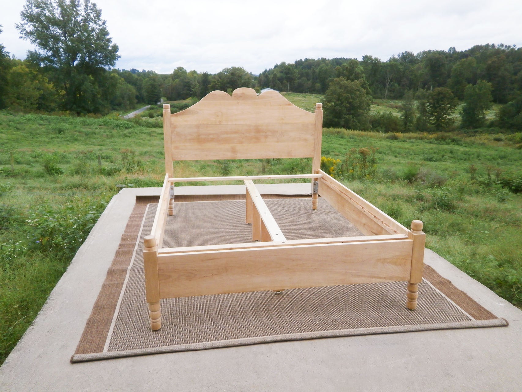 classic four poster bed with headboard