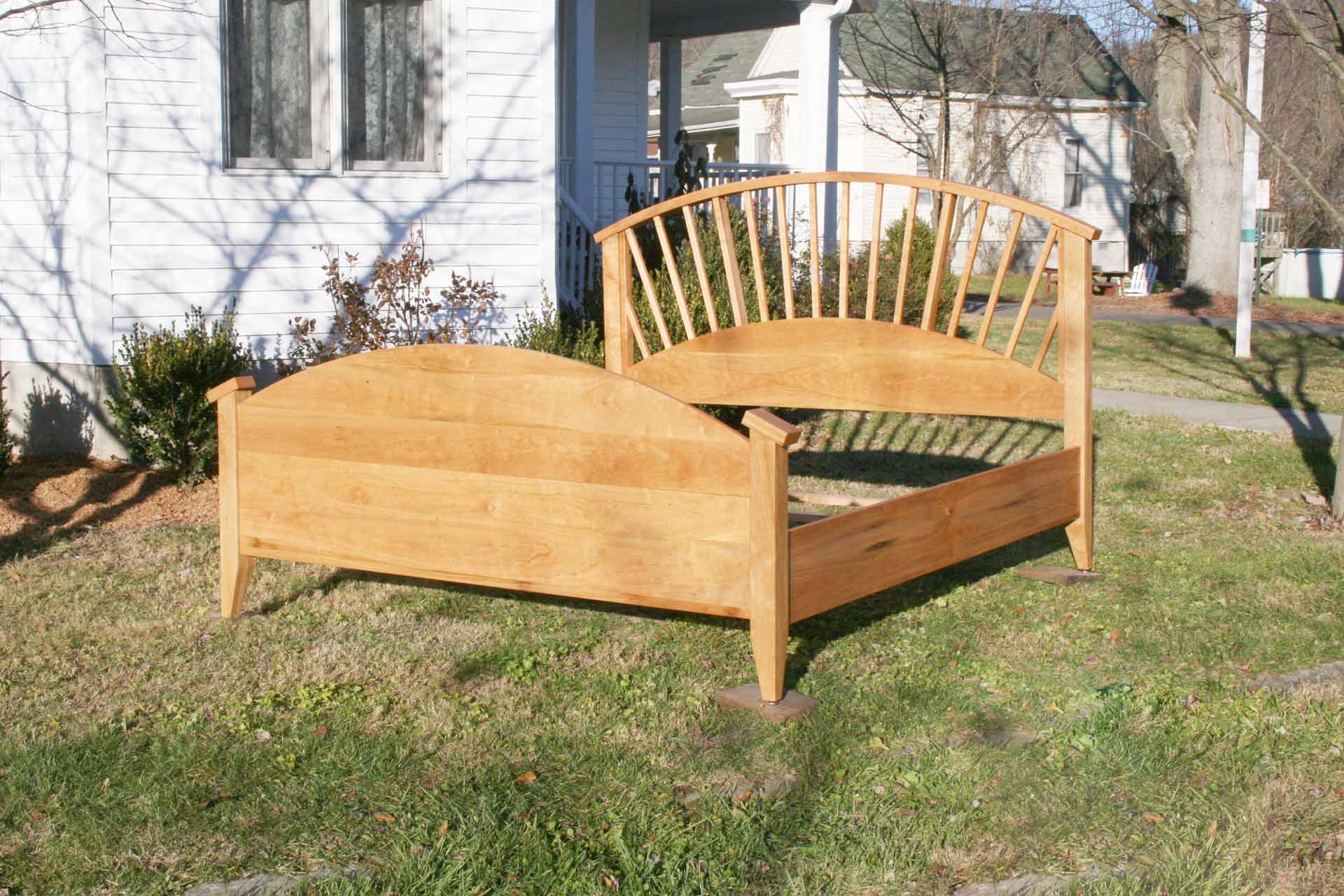 arched bed with spokes zoomed out side view