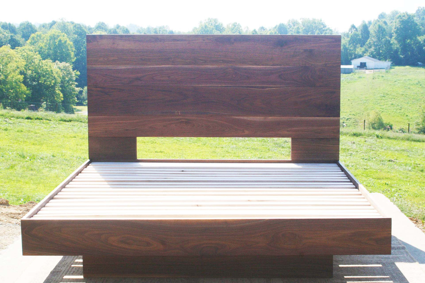 floating platform bed walnut front view