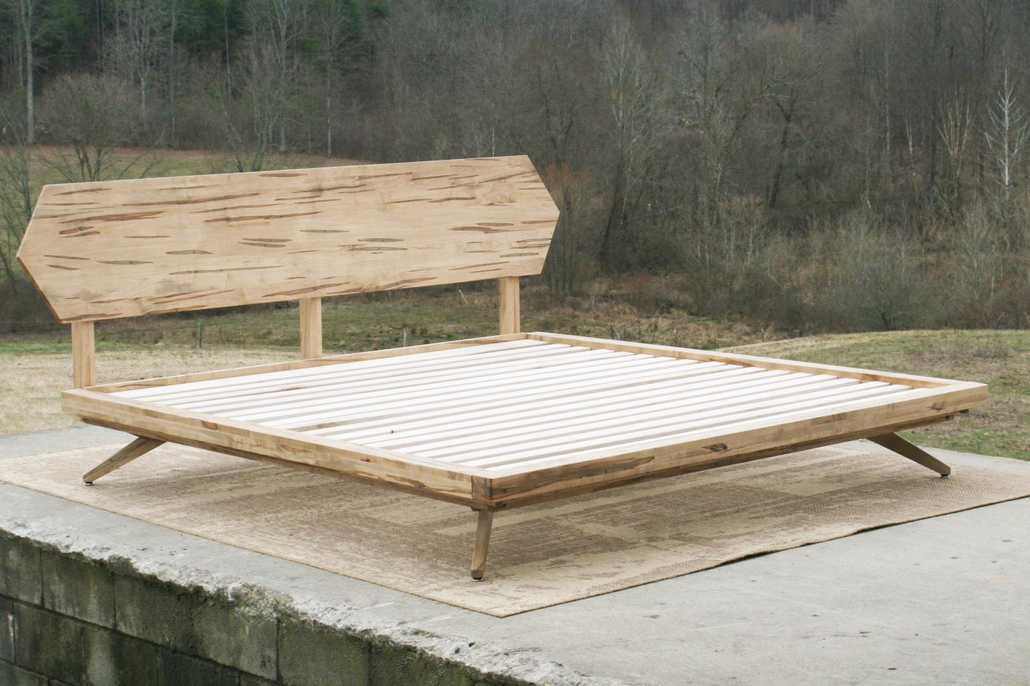 angled view Mid century low platform bed
