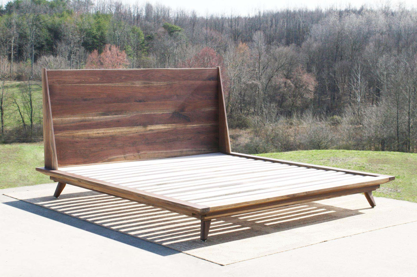 walnut mid century modern platform bed angled view