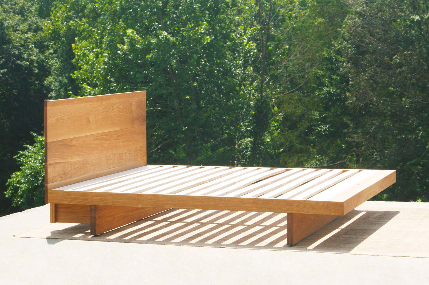 natural cantilever platform bed with headboard