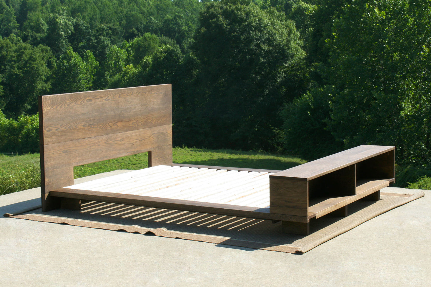 angled view Low platform bed with bookcase foot-end