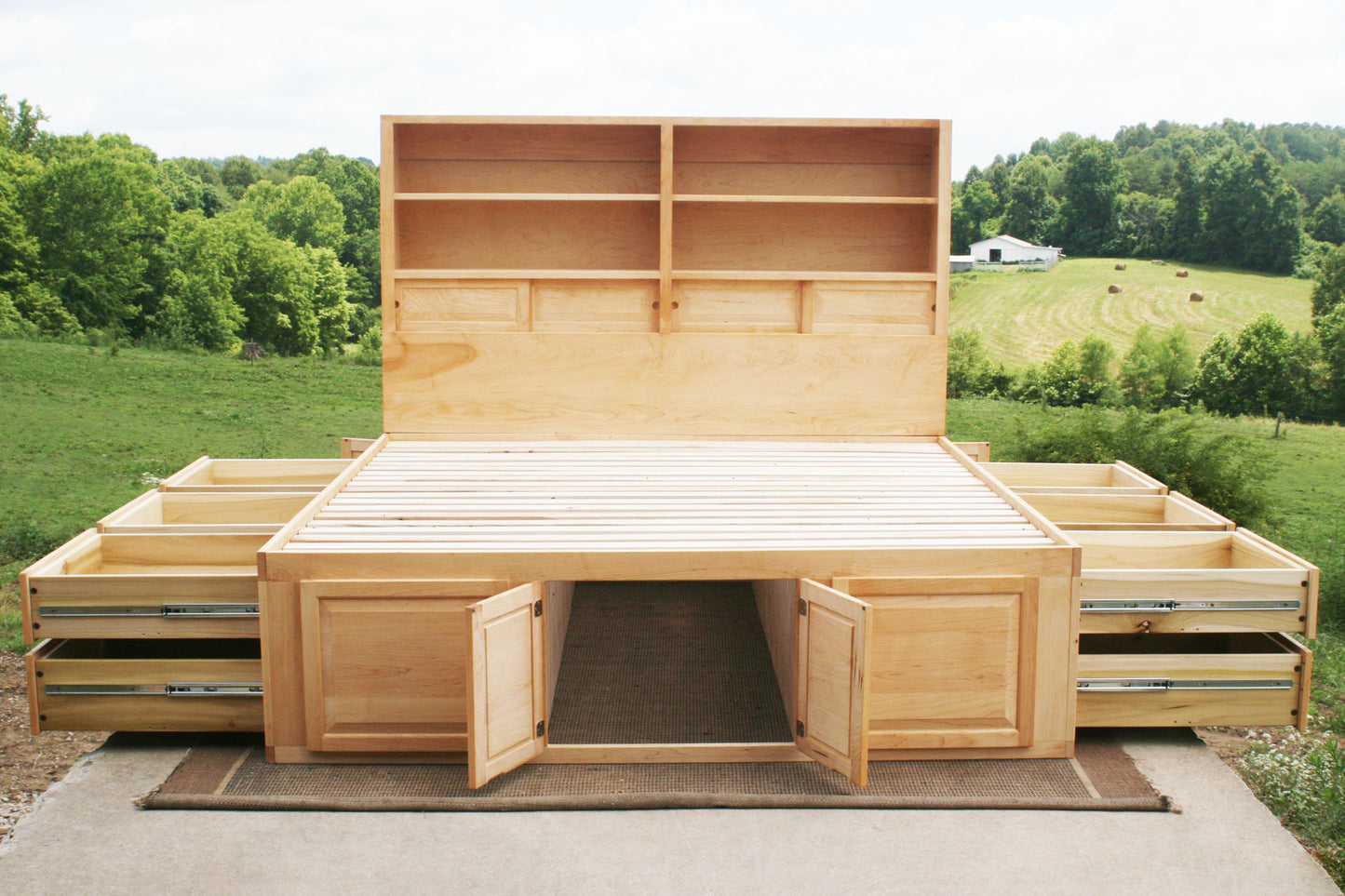 12 drawer captain's bed with storage headboard and drawers out front view