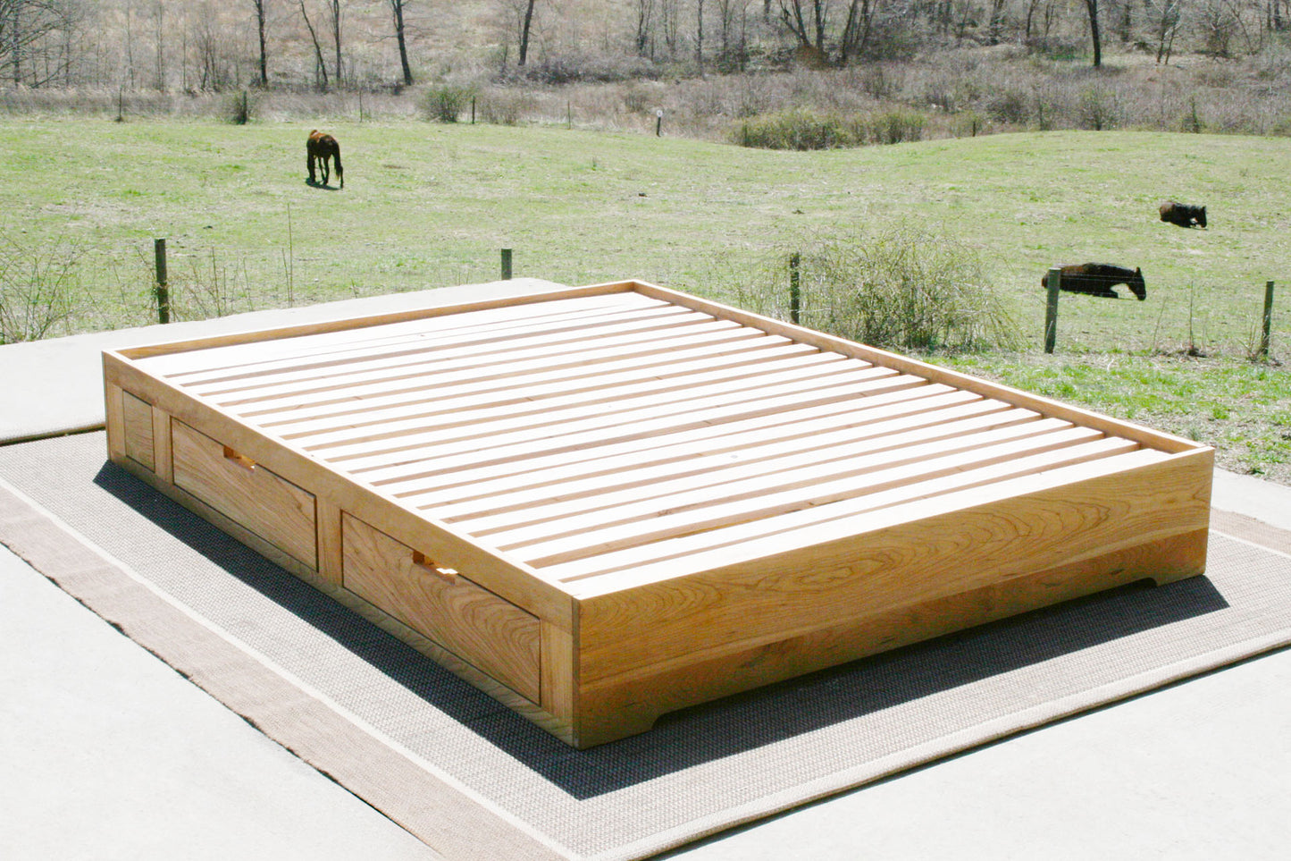 angled view Low profile storage bed with 4 drawers