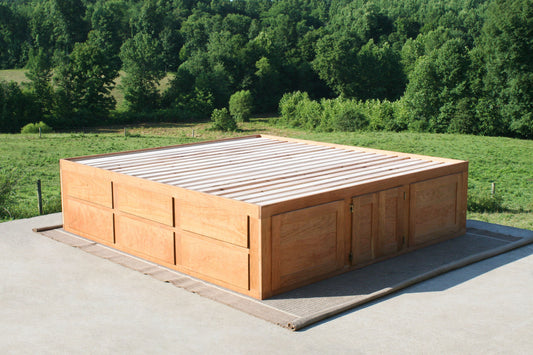 side angled view Platform bed with 12 drawers and center storage area