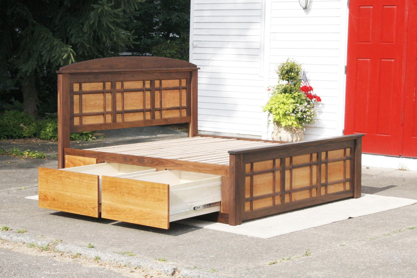 drawers open angled view Storage Bed with 4 drawers and grid-trim