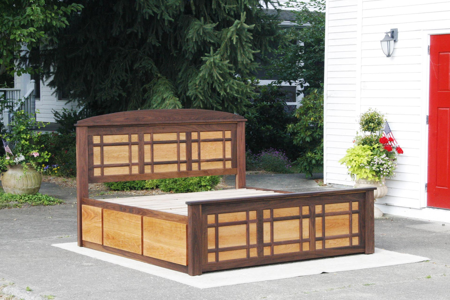 angled view Storage Bed with 4 drawers and grid-trim natural