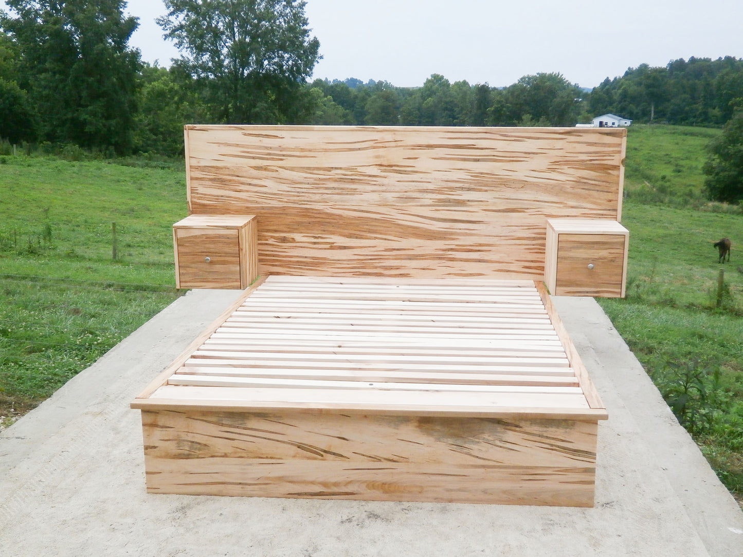front view natural 6 drawer storage bed with built-in nightstands
