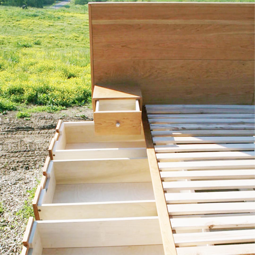 drawers open of 6 drawer storage bed with built-in nightstands