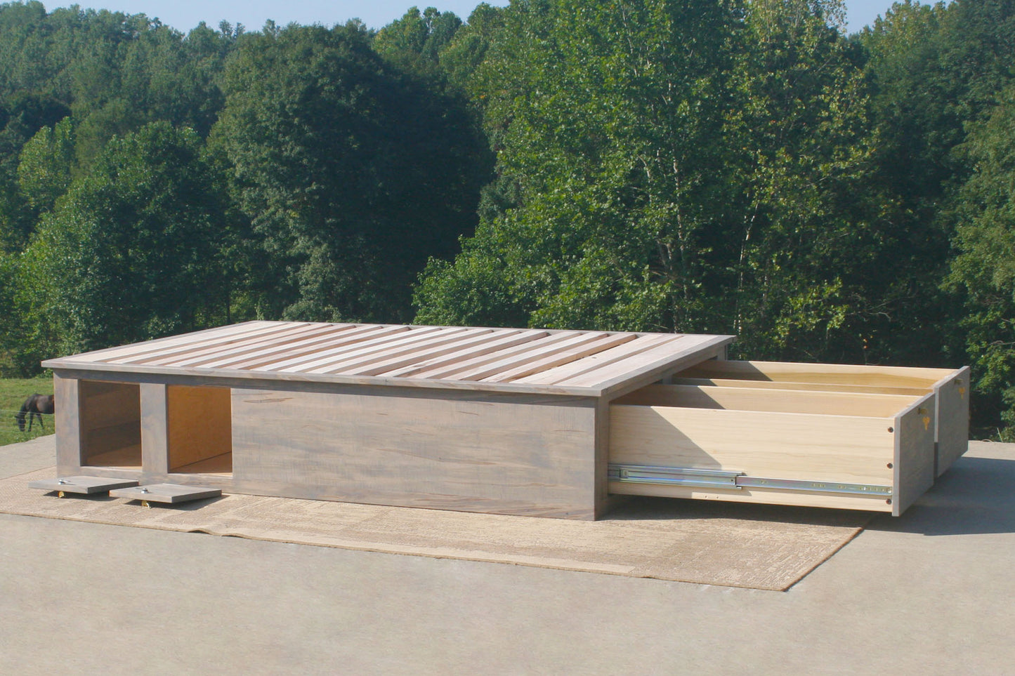 Platform bed with drawers open