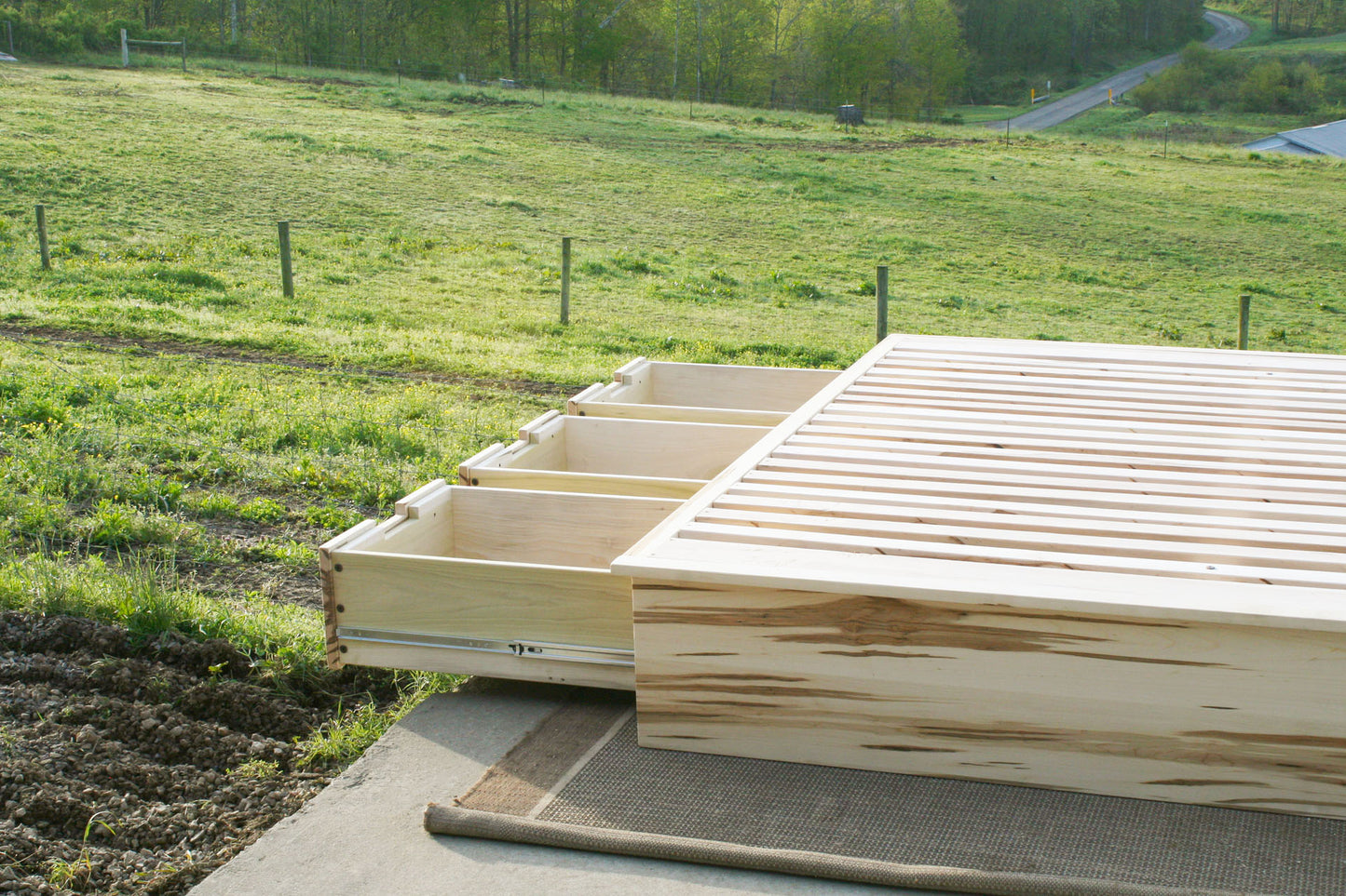 drawers out close up Platform storage bed wormy maple