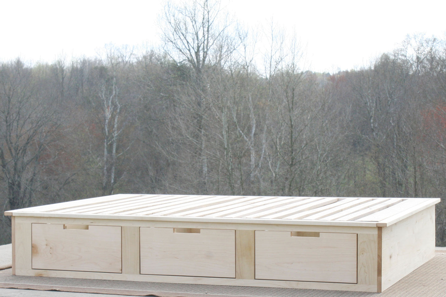 low angled view Platform storage bed hardwood