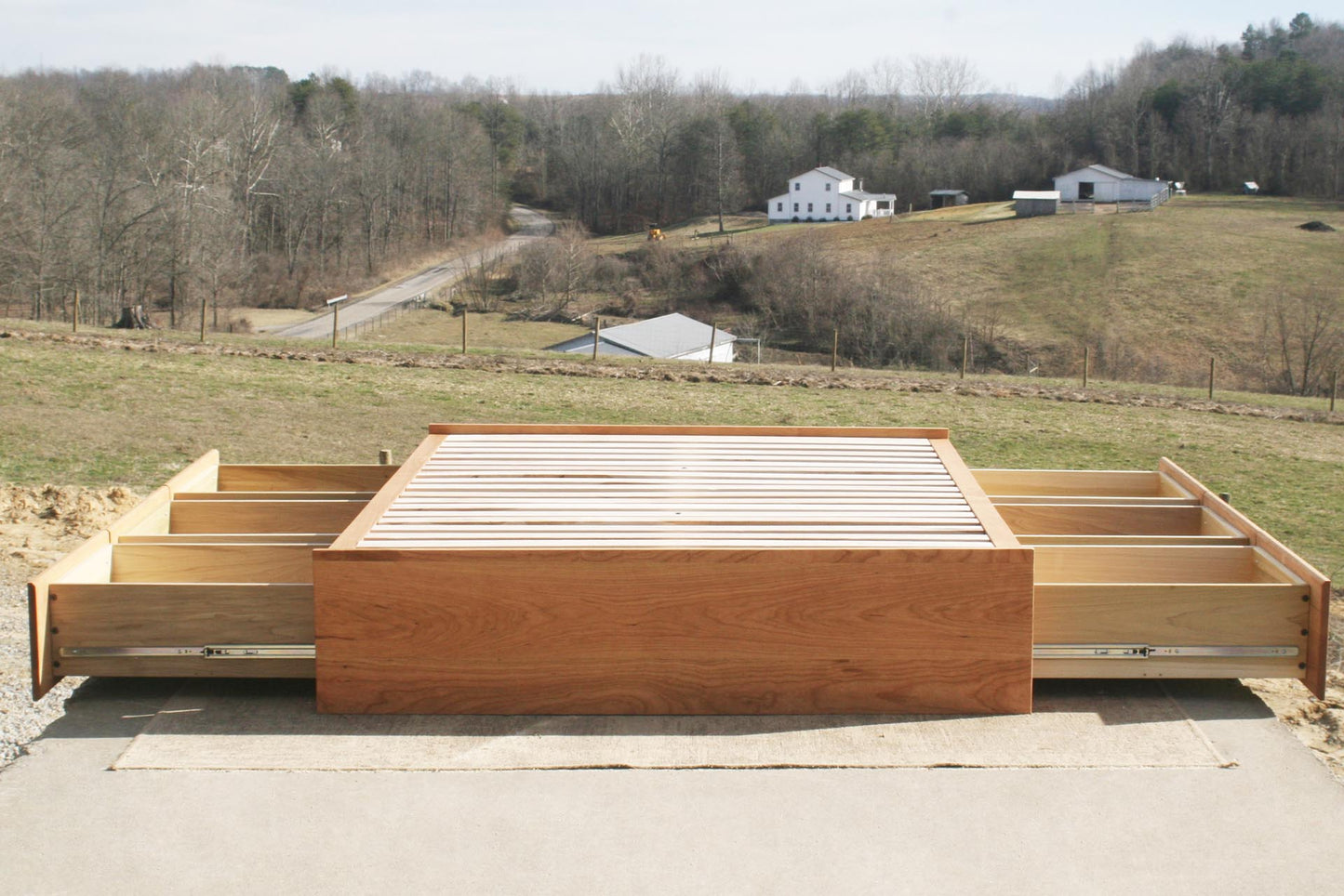 Low Storage Bed with 6 opened drawers front view