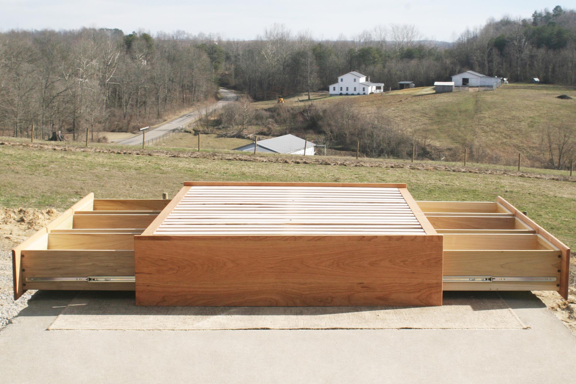 Low Storage Bed with 6 opened drawers front view