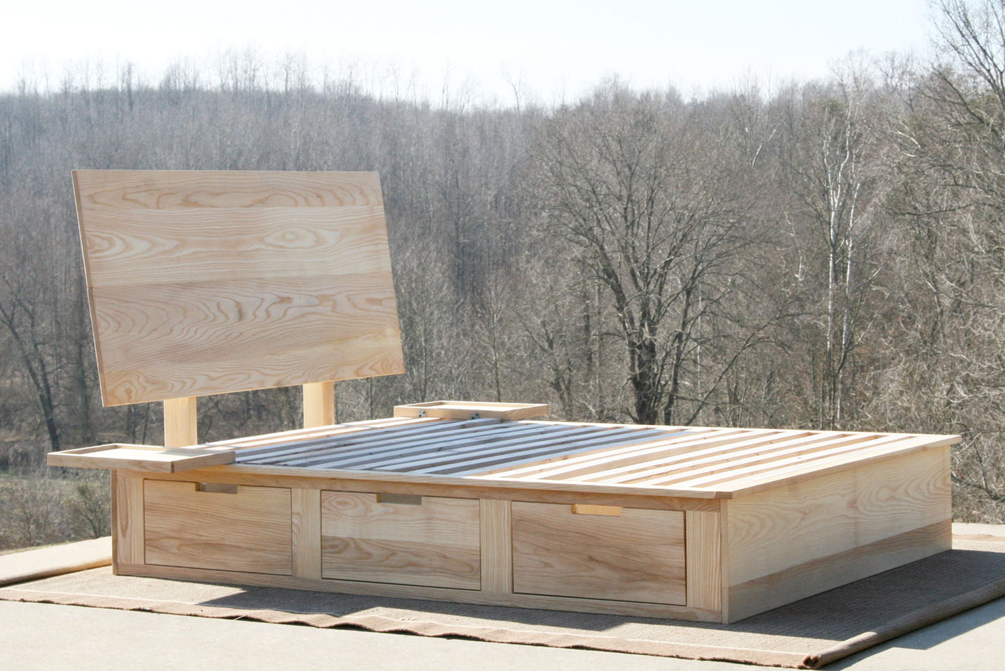 angled side view Storage Bed with 6 drawers and angled headboard