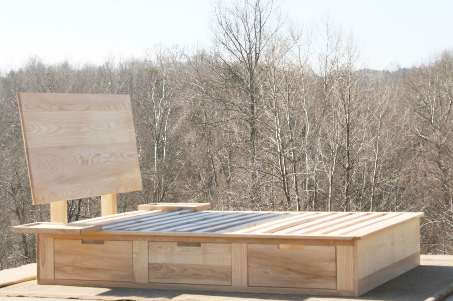 side view natural Storage Bed with 6 drawers and angled headboard