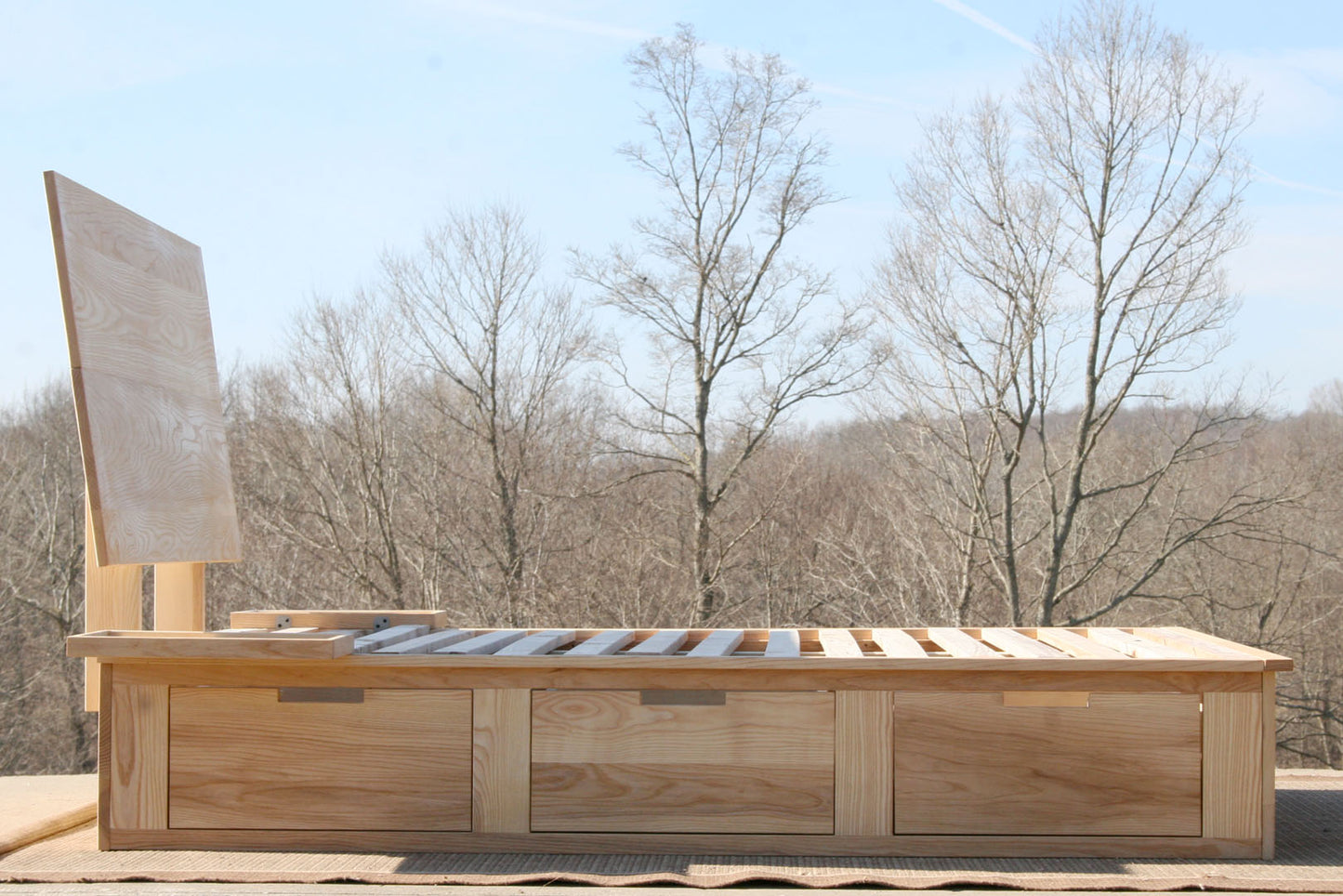side view Storage Bed with 6 drawers and angled headboard