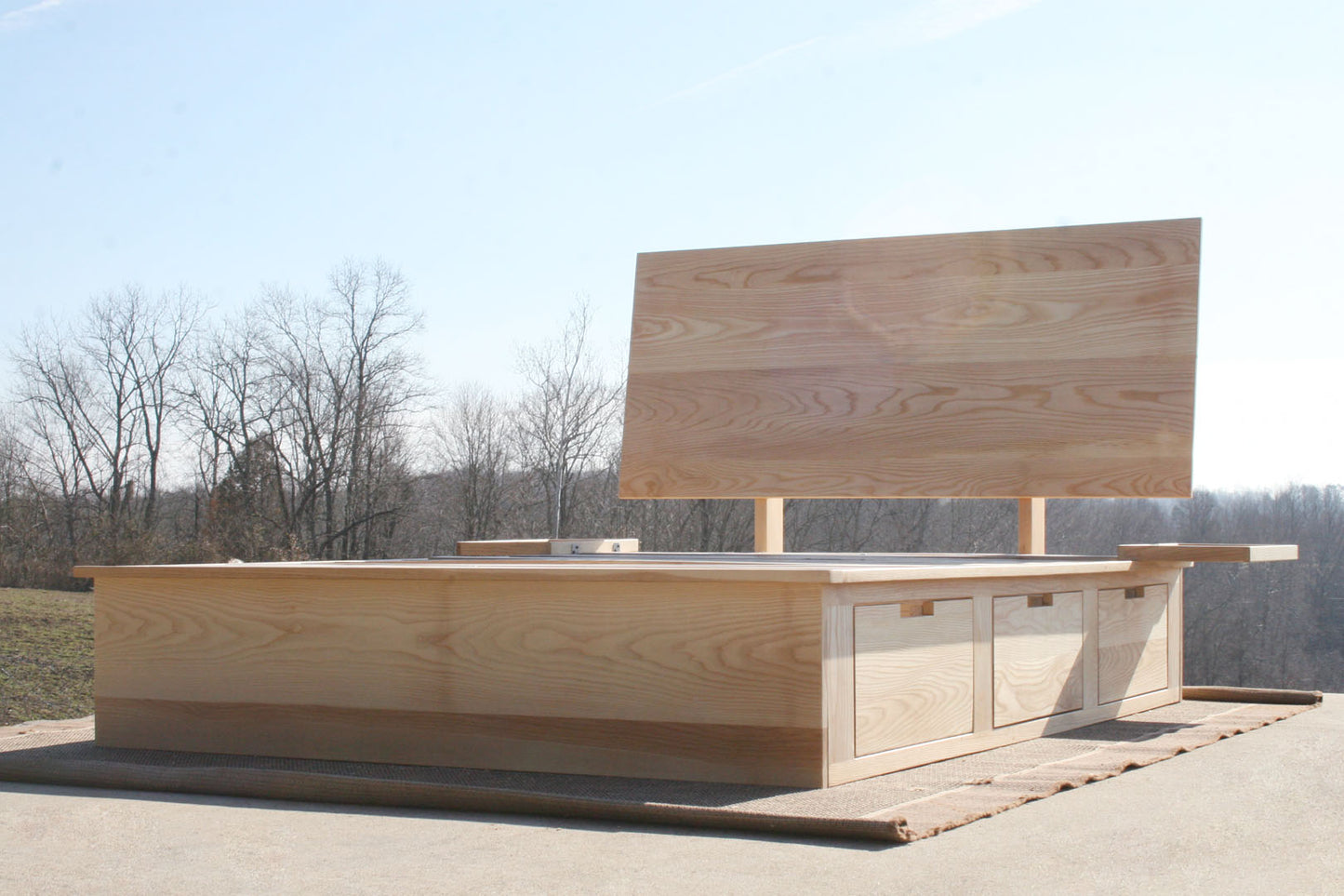 low angled view Storage Bed with 6 drawers and angled headboard