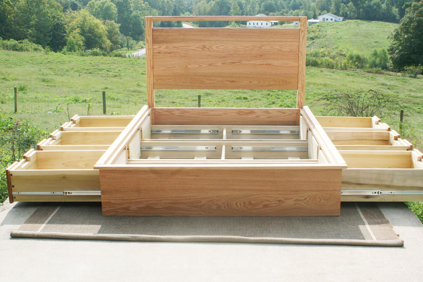 no slats front view Platform Bed with 6 drawers and headboard with top bar with drawers out
