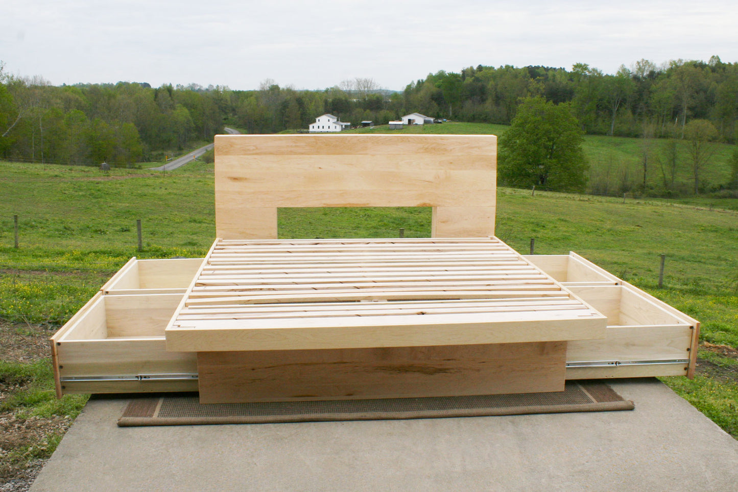 front view Four drawer storage bed with headboard storage with drawers open
