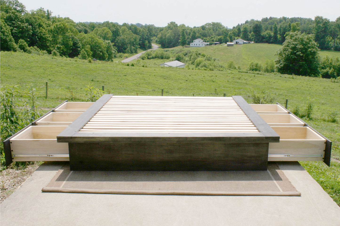 front view 6 drawer storage bed with wide platform extensions with drawers open