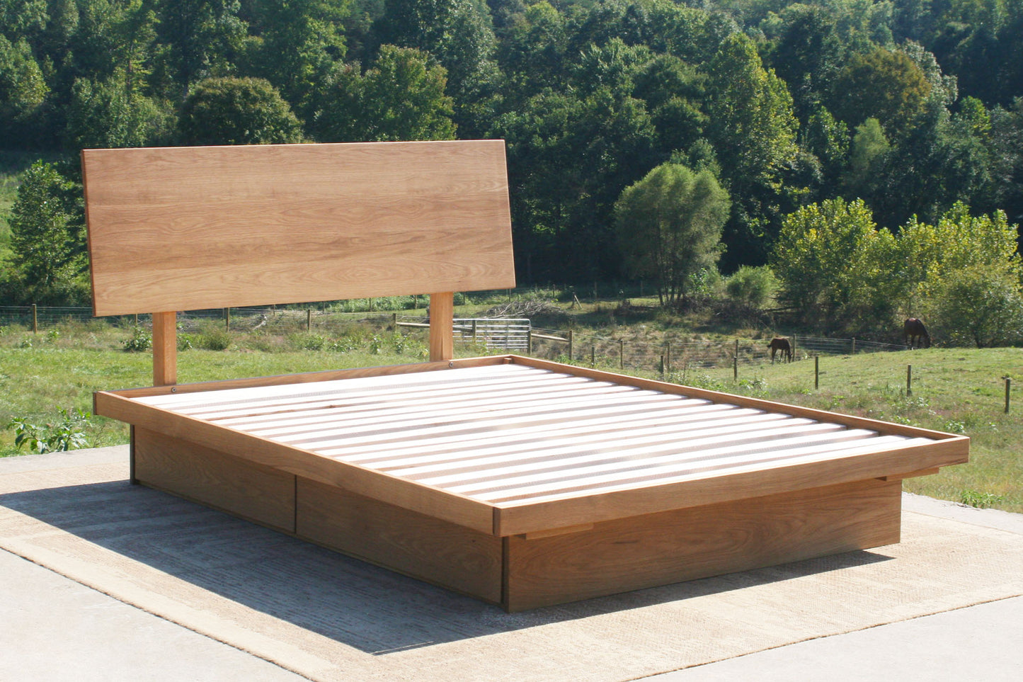 low platform storage bed with 4 drawers angled view