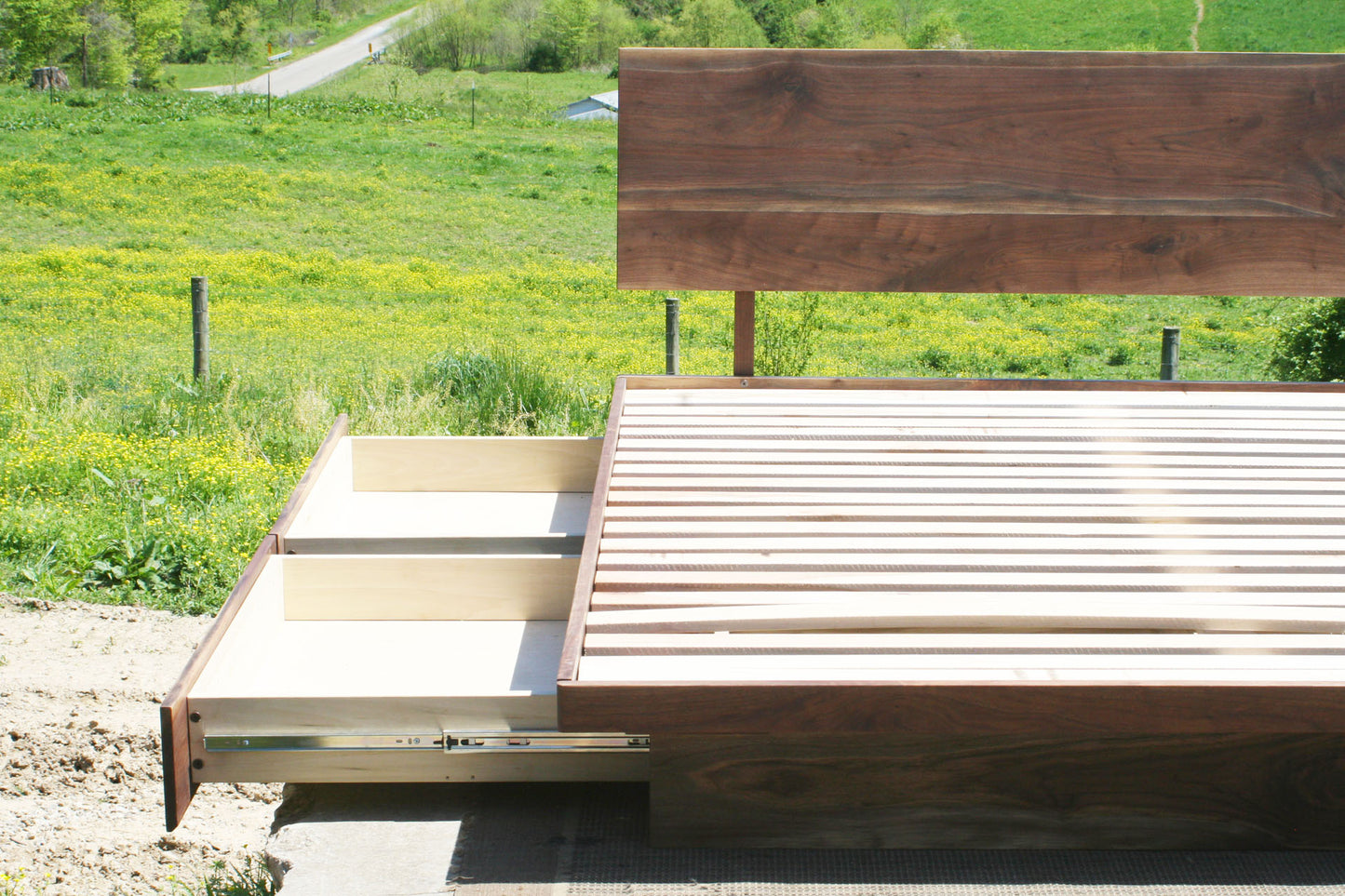right side of drawers out close up Low platform storage bed with 4 drawers