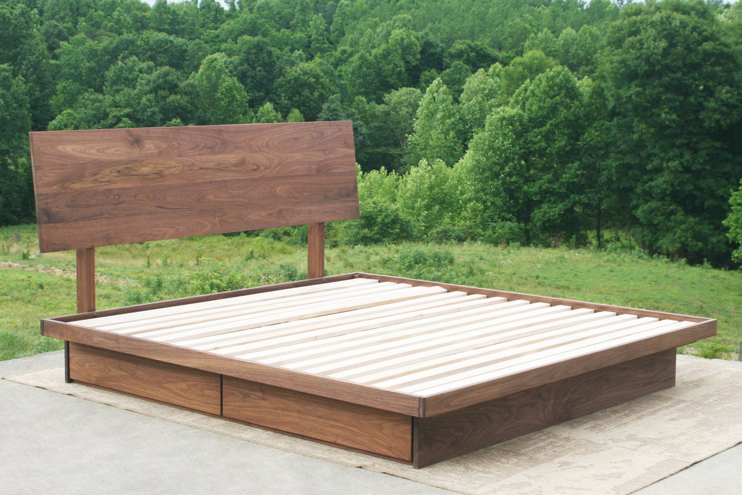 angled view of Low platform storage bed with 4 drawers