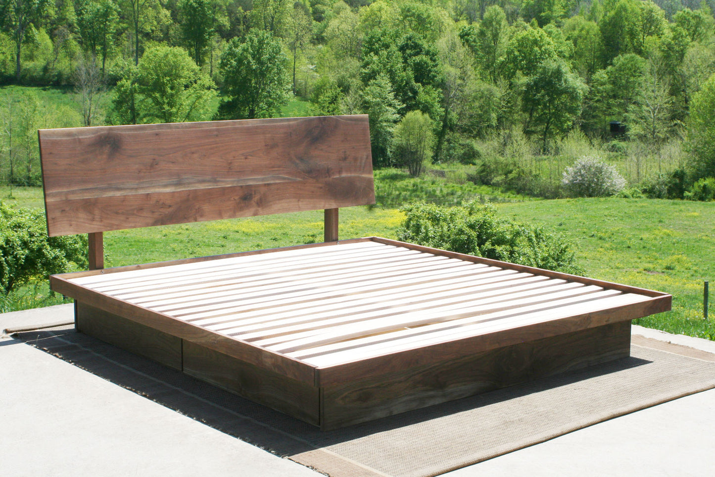 angled view Low platform storage bed with 4 drawers