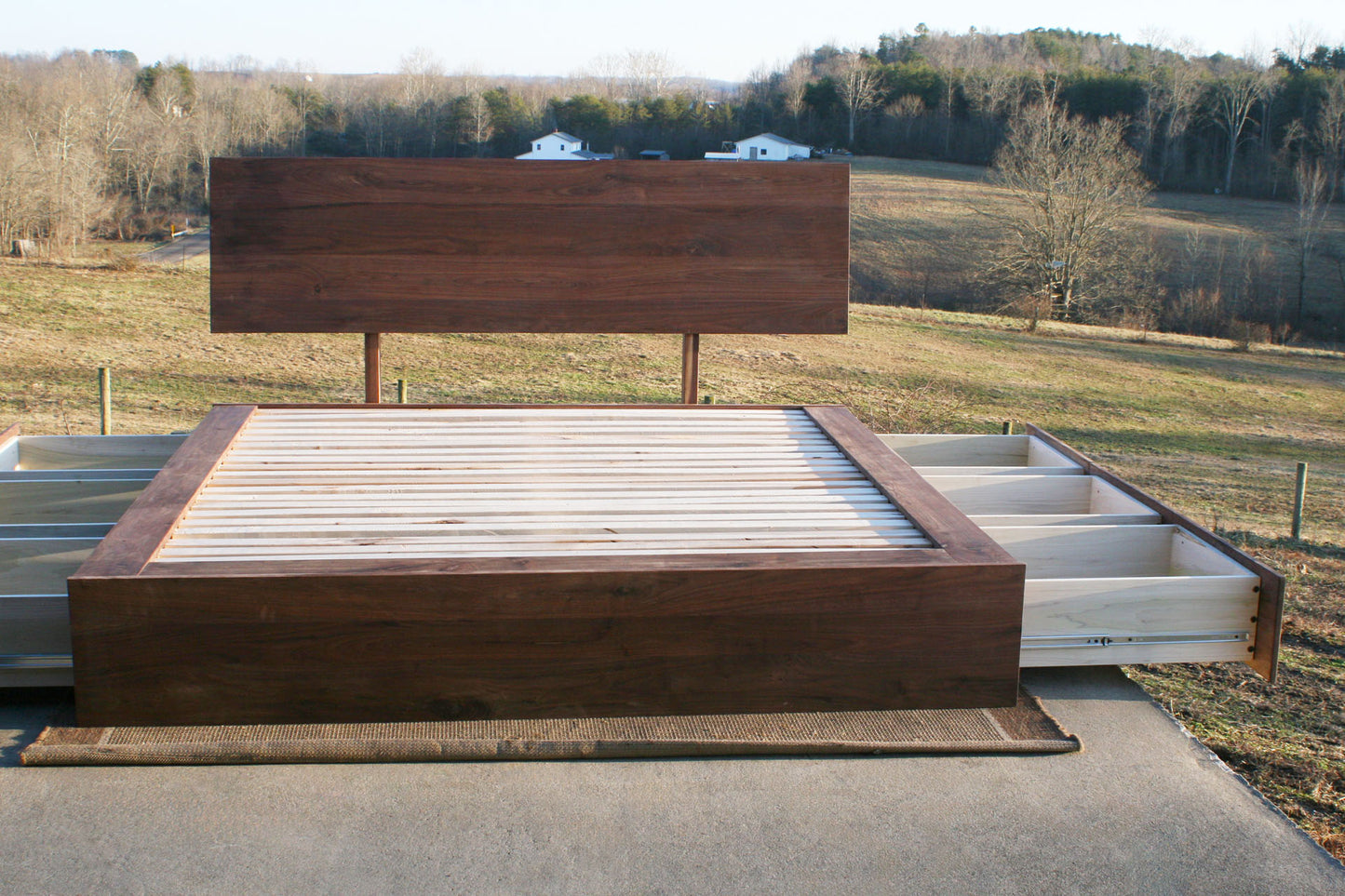 front view natural Low Platform Bed with 6 drawers open and angled headboard