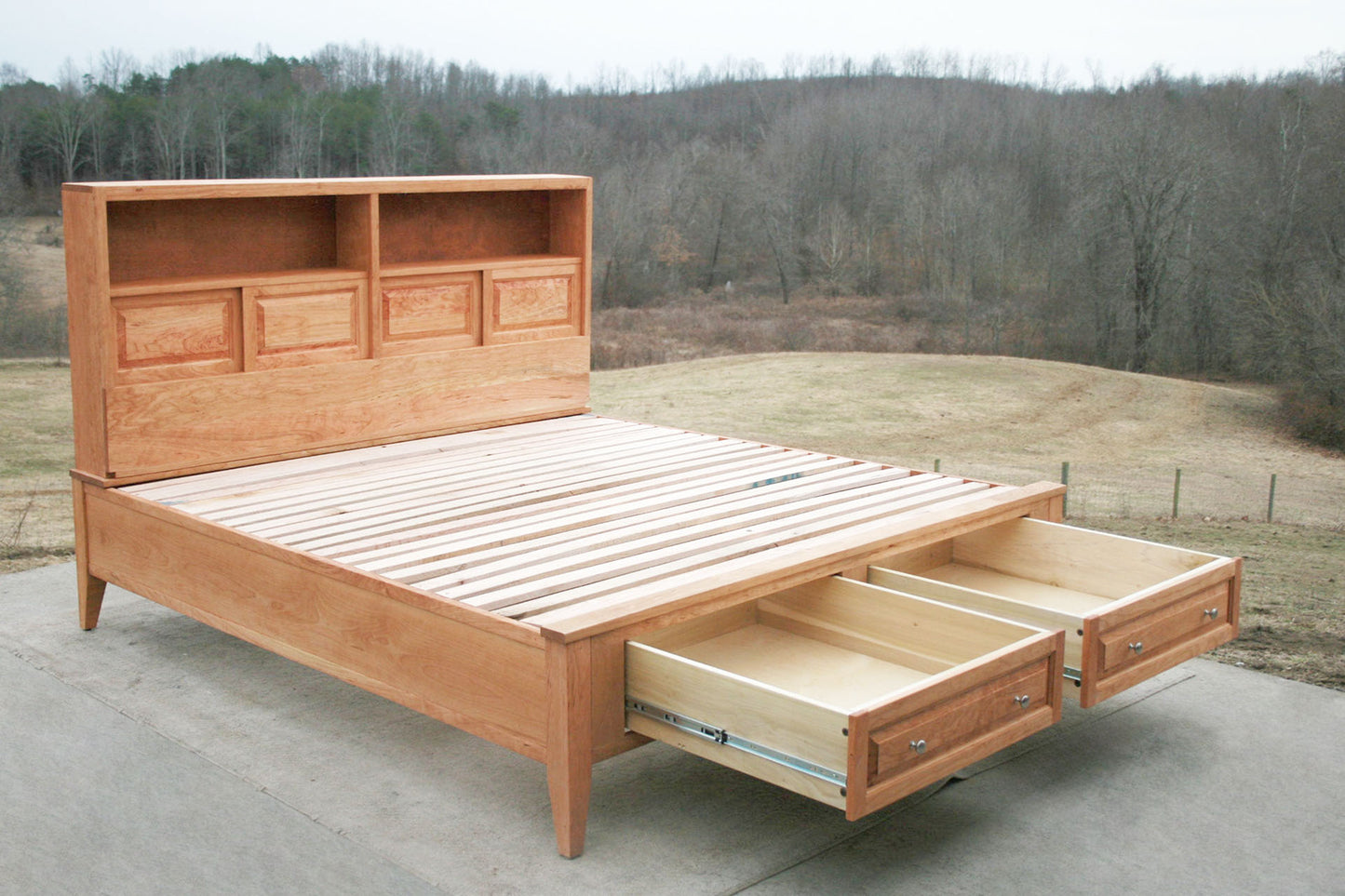 angled view drawers open Platform Bed with 2 drawers in foot-end and storage headboard with shelves