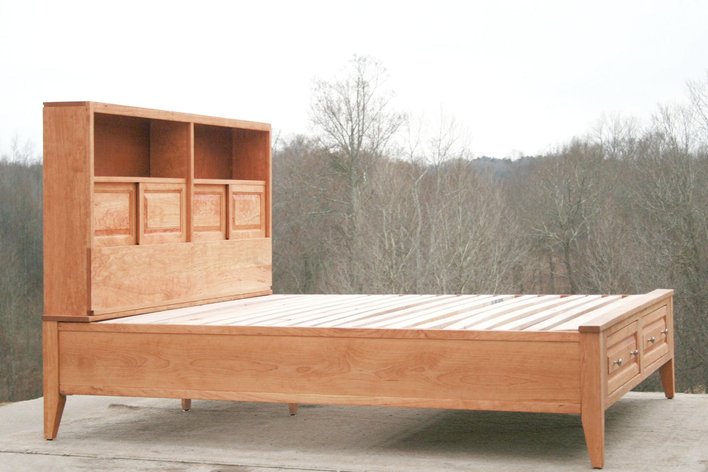side view Platform Bed with 2 drawers in foot-end and storage headboard with shelves