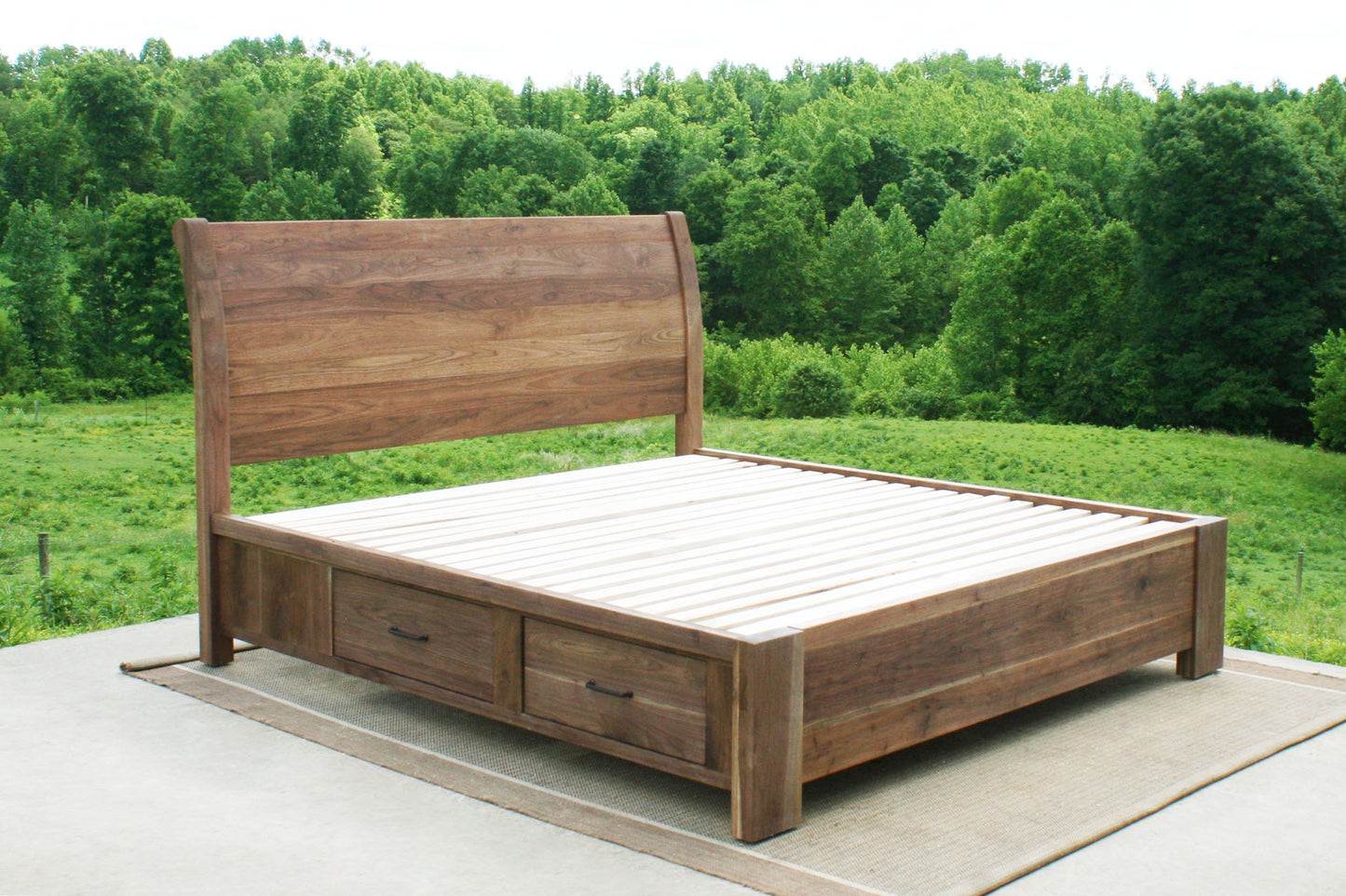 angled view Sleigh Platform bed with 4 drawers and large posts
