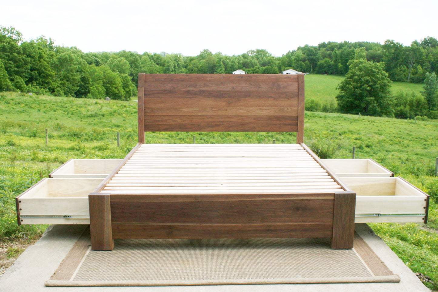 front view drawers out Sleigh Platform bed with 4 drawers and large posts