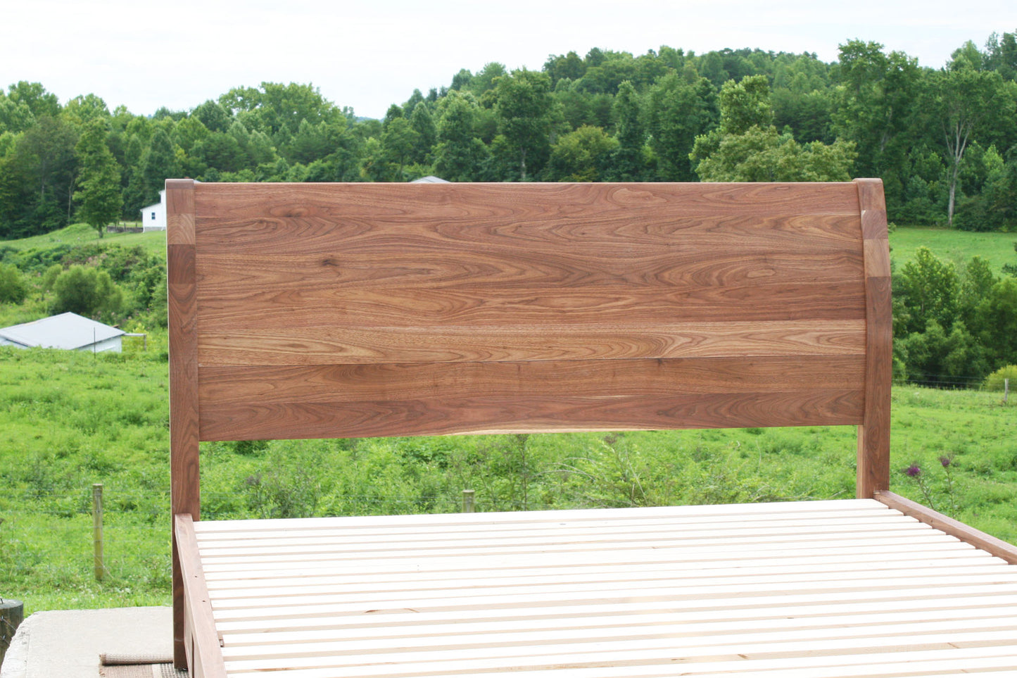 front view of headboard of Sleigh Platform bed with 4 drawers and large posts