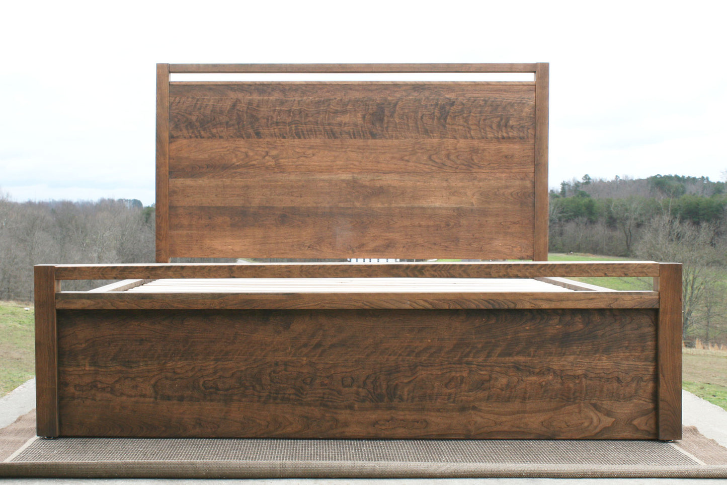 low front view natural hardwood Storage Bed with top-rail head and footboard