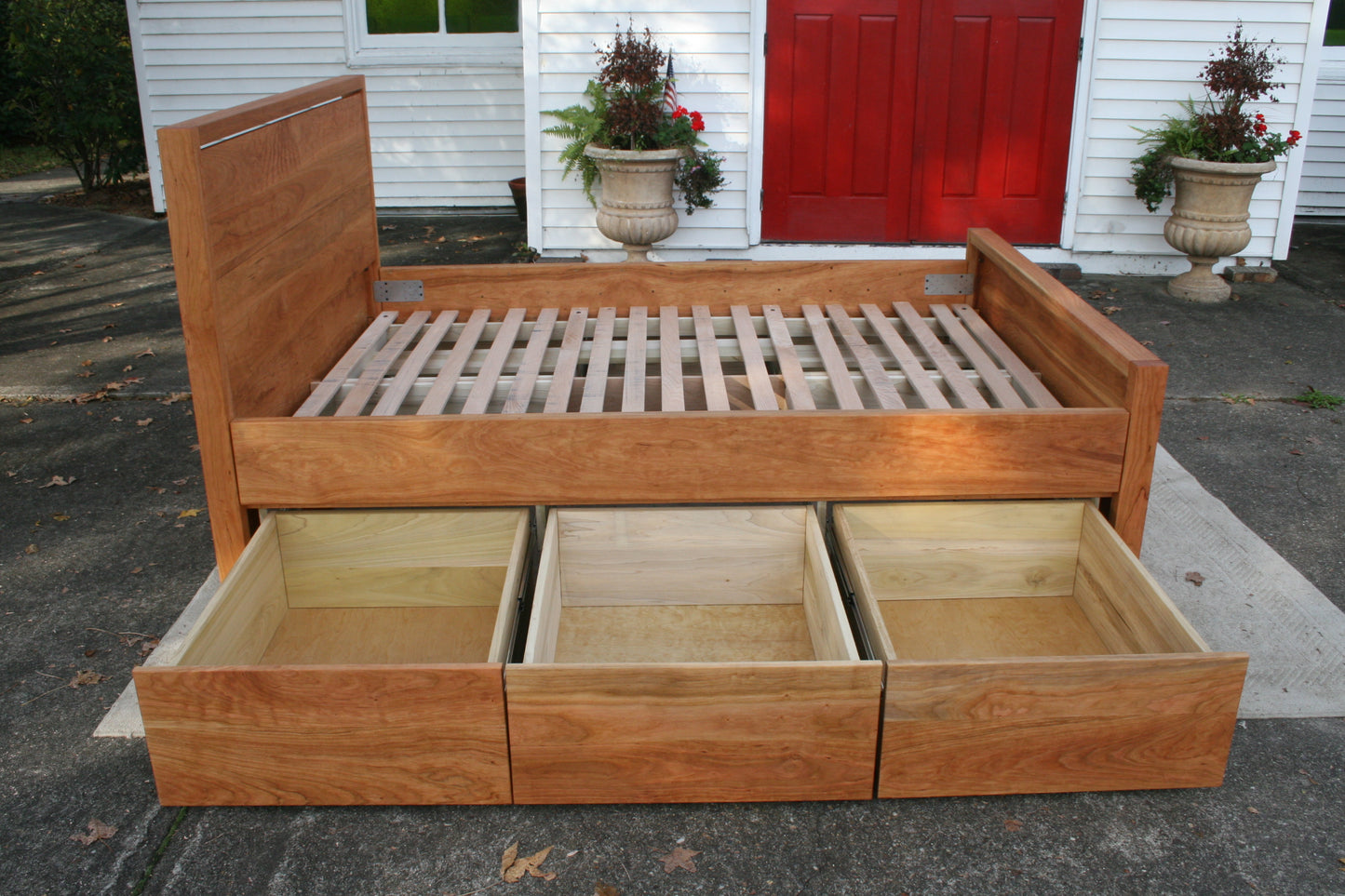 recessed platform bed with 6 drawers drawers open side view