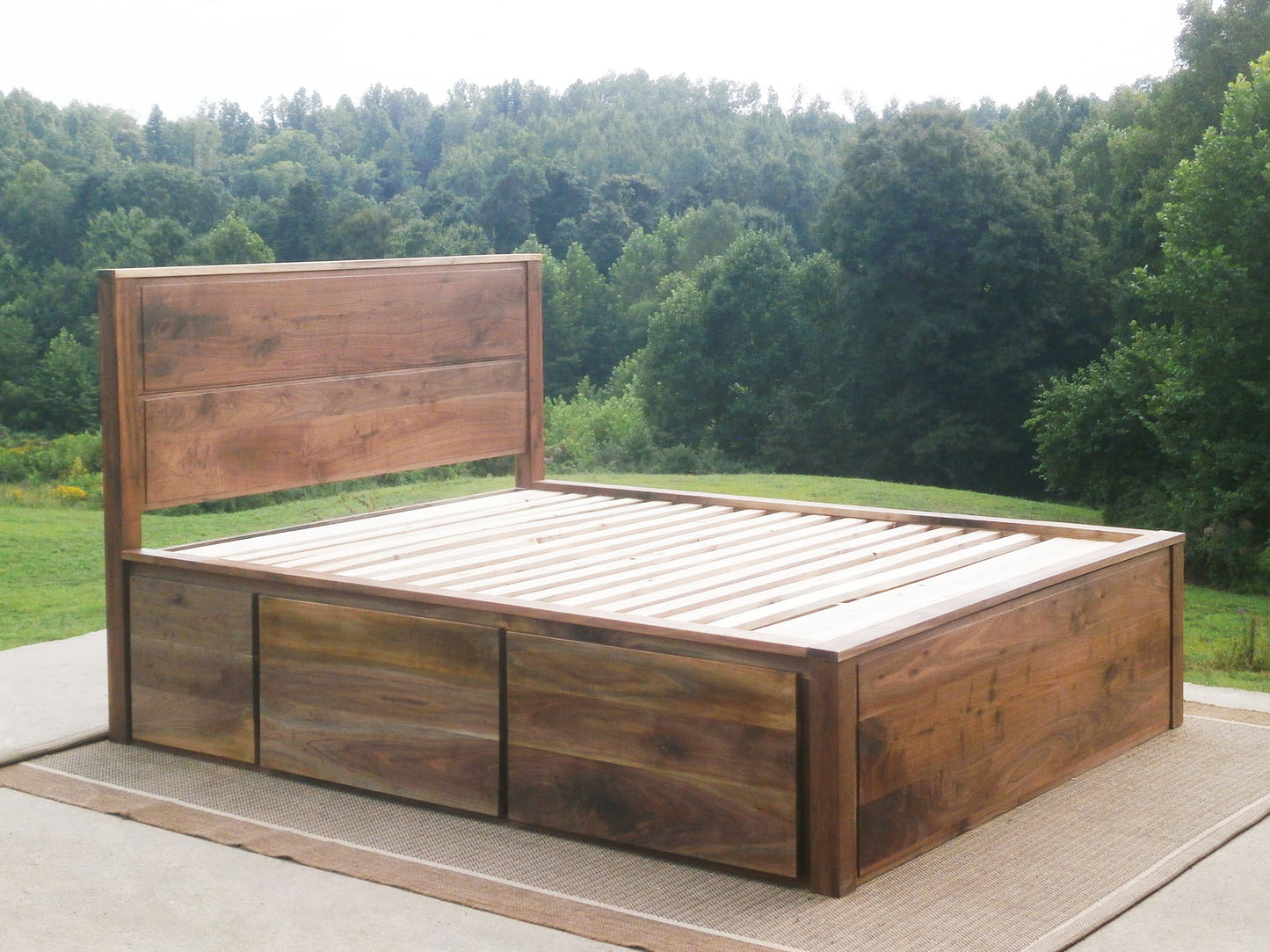 natural wood angled view Storage Bed with 4 drawers, recessed frame headboard and toe kick