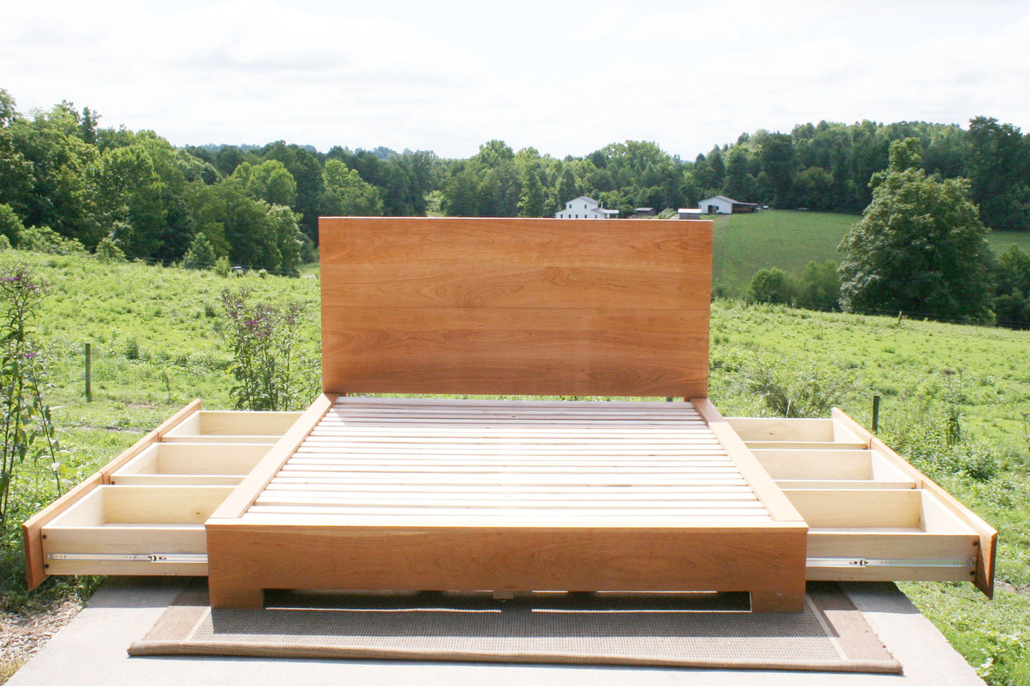 Low Storage Bed with 6 drawers open and thick headboard