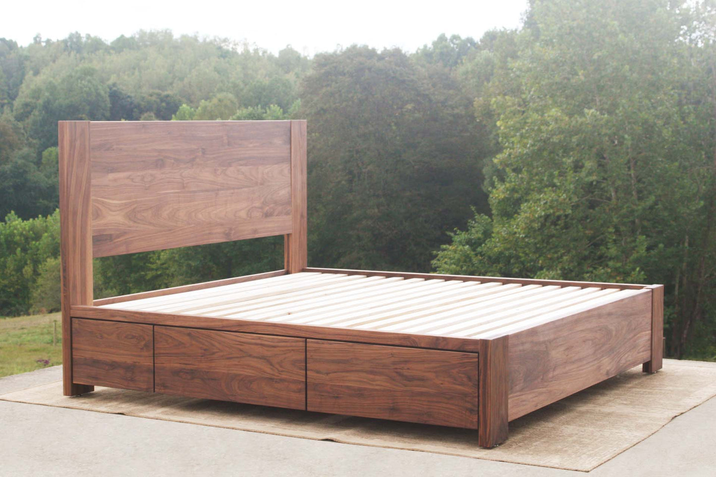 angled view walnut Platform Bed with 4 drawers plus Cubby
