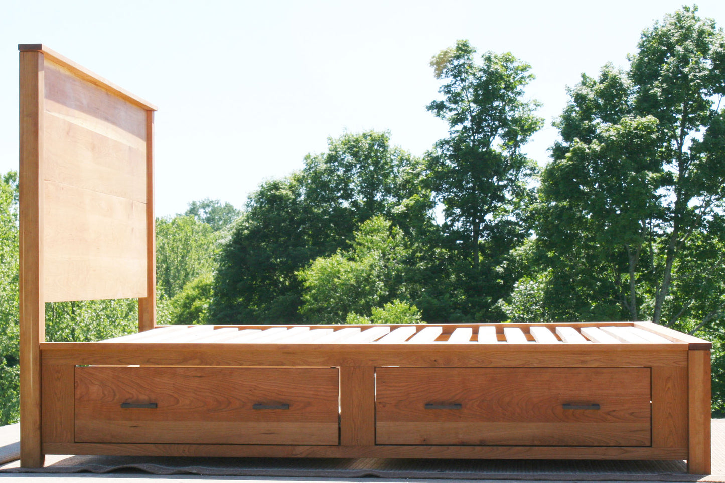 side view wood Storage Bed with 4 inset drawers and headboard