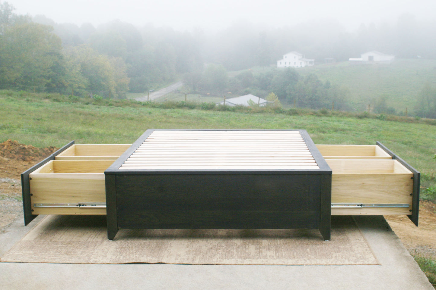 front view wood Platform Bed with 4 drawers out and tapered feet