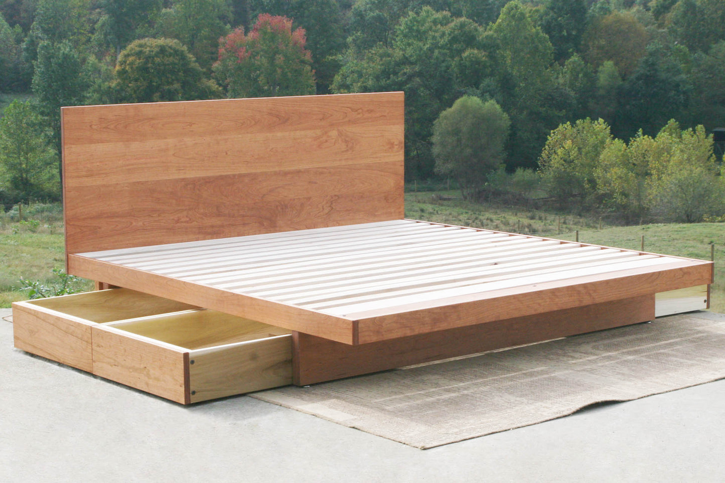 cantilever storage bed with 4 drawers open and headboard