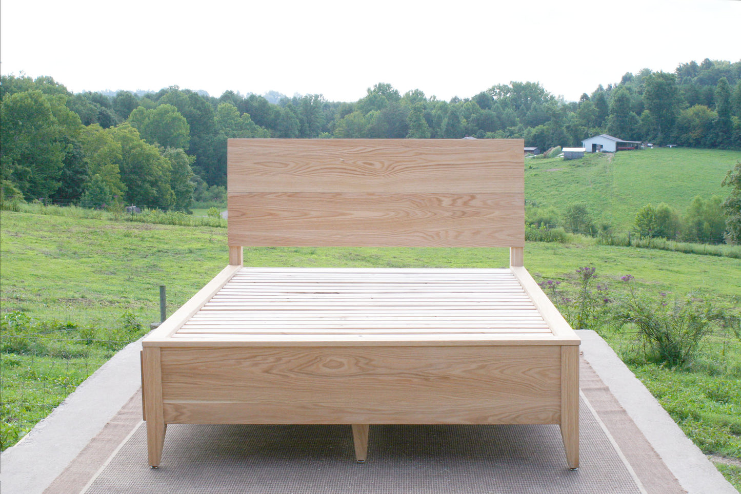 natural hardwood front view Platform storage bed with headboard