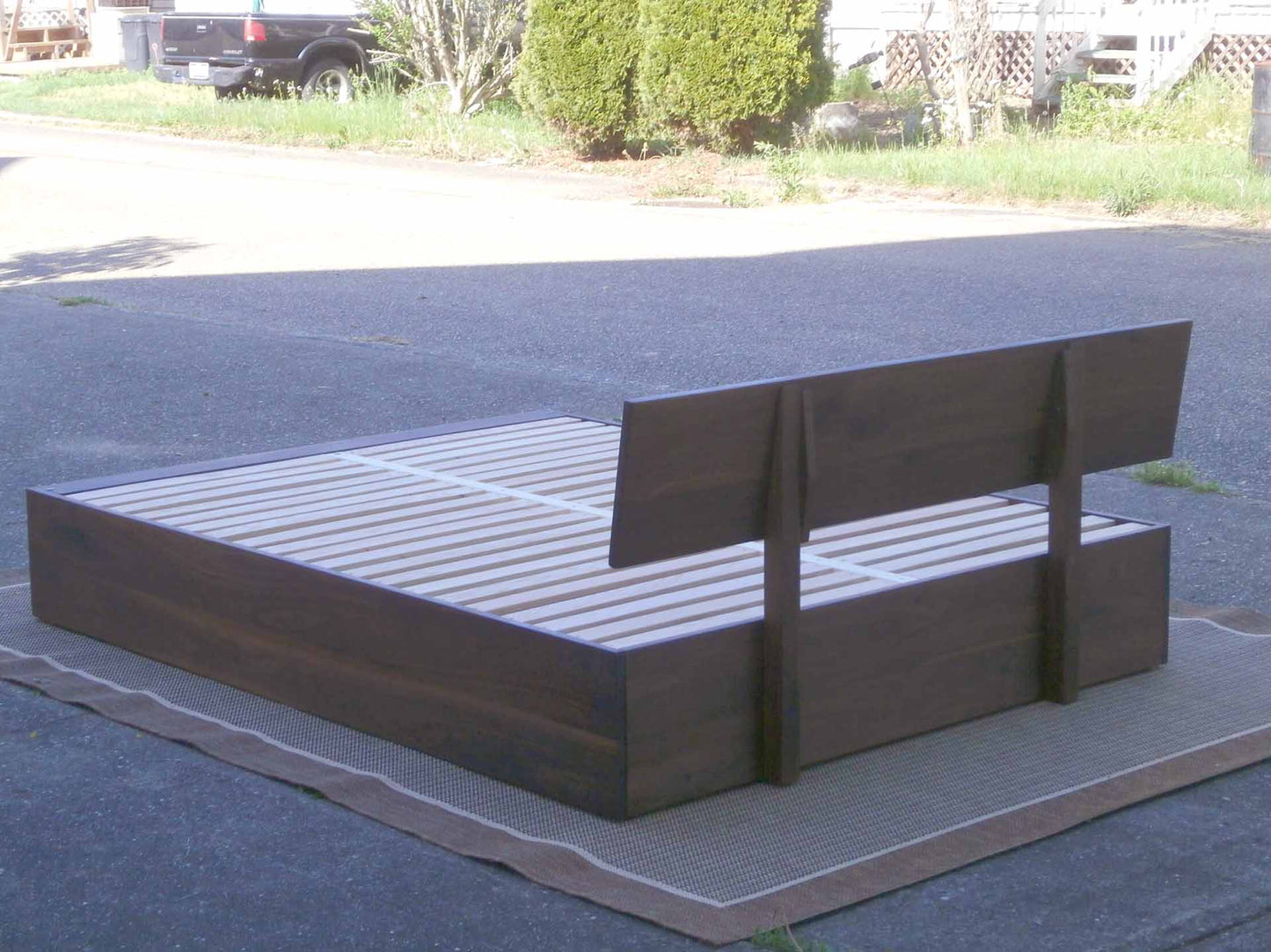 angled view back of Trundle Bed with headboard