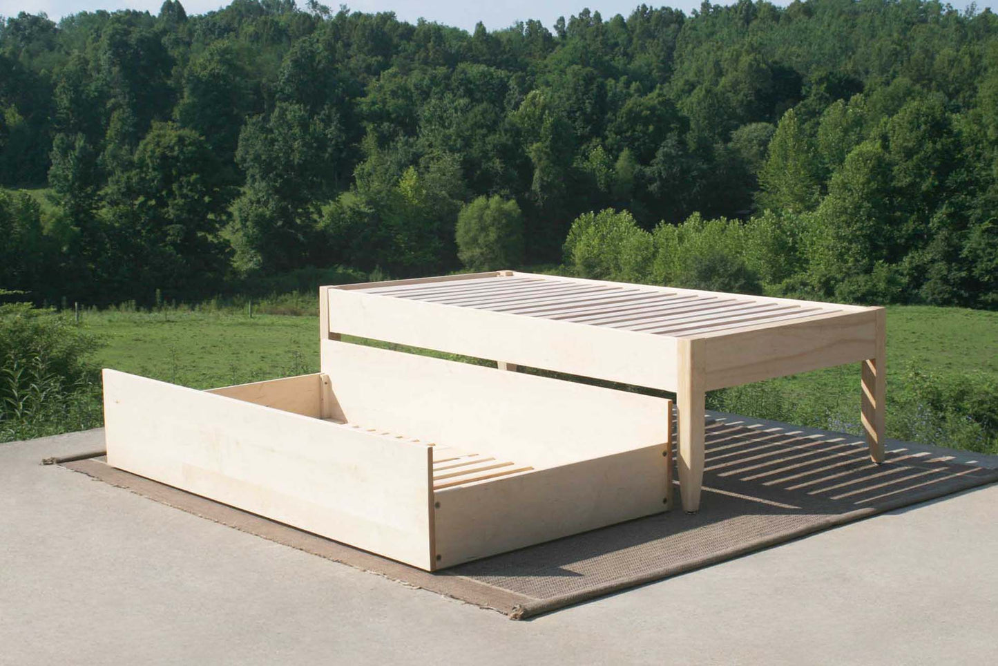 angled view natural Simply Elegant Platform Bed with Trundle trundle out